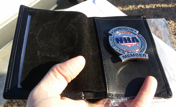 National Handgun Association badge with leather wallet